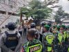Sinergitas Polres Metro bersama TNI Kodim 0411 KM melaksanakan Patroli Cipta Kondisi Pasca Aksi Damai di Kota Metro